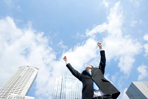 Man reaching for the sky